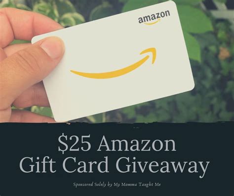 someone holding up a $ 25 amazon gift card