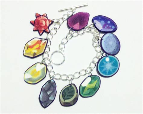 Pokemon Evolutionary Stone Charm Bracelet by BadWolfCosplay