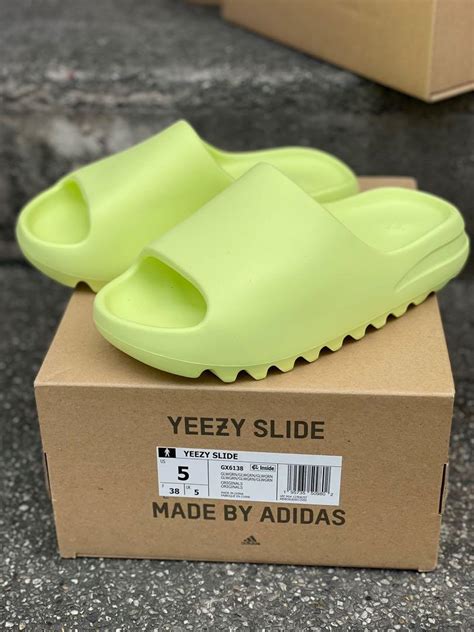 Adidas Yeezy Slides Glow Green, Men's Fashion, Footwear, Slippers & Slides on Carousell