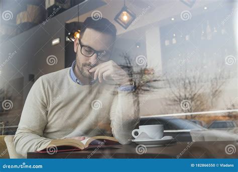 Man Reading a Book in Coffee Shop Stock Photo - Image of adult, cafe ...