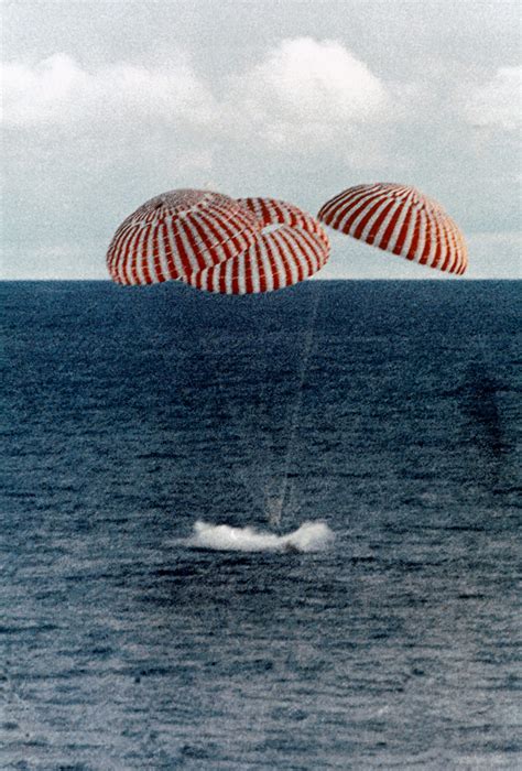 Apollo-13-splashes-down-parachutes | EarthSky