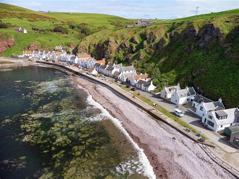 Aerial view of Pennan village, Aberdeenshire, Scotland Photograph by ...