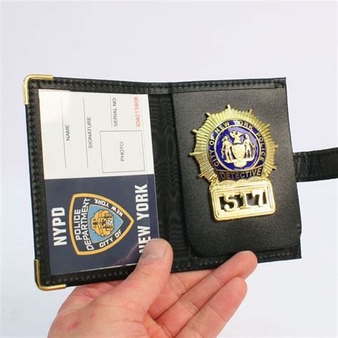 Full size metal replica of an NYPD detective badge and leather wallet ...