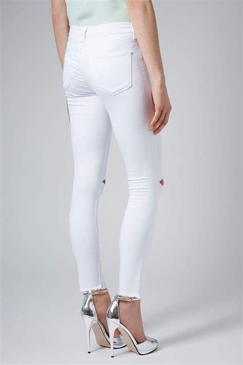 Topshop Petite Moto White Ripped Leigh Jeans in White | Lyst