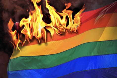 Pride flag on fire, Photo Illustration by Todd Franson - Metro Weekly