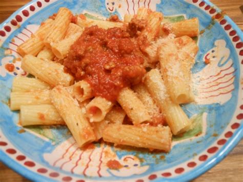 Classic Soffritto with Spicy Italian Sausage in Tomato Sauce | Cooking with Candi