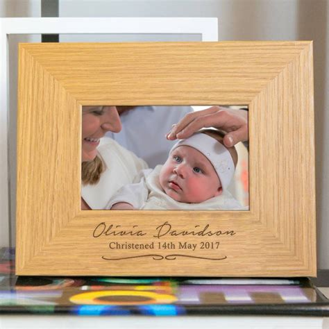 A sweet, classic Christening frame for baby, permanently engraved with ...