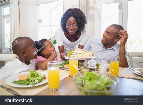 Black family eating dinner Images, Stock Photos & Vectors | Shutterstock