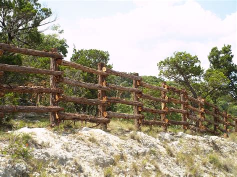 Cedar Post Four Rail Ranch Fence in Boerne, Texas