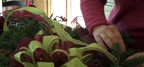 How to Make a holiday wreath with pinecones and ribbon « Flower Arrangement :: WonderHowTo