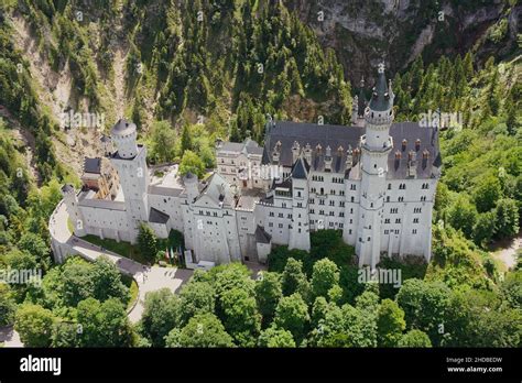 Aerial view of Neuschwanstein Castle. Paragliding above Schloss Neuschwanstein in Bavaria ...