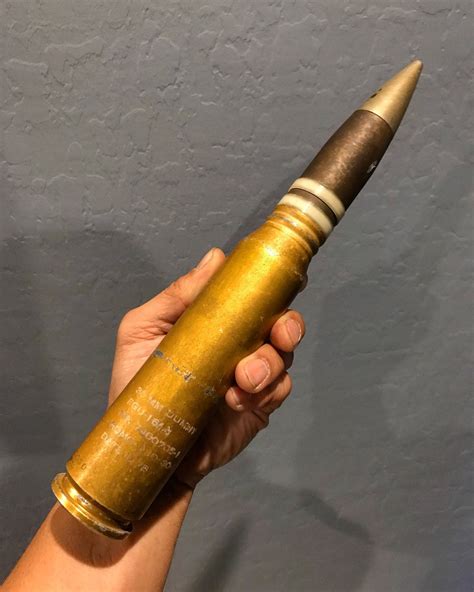 30mm round from a General Electric GAU-8/A Avenger, which is a hydraulically driven seven-barrel ...