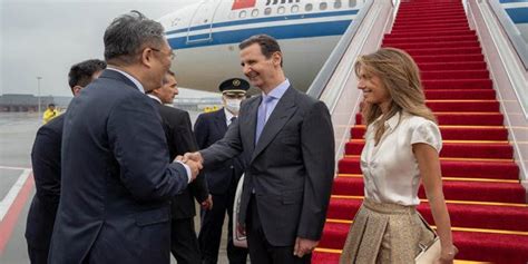 President Bashar al-Assad and First Lady Asma al-Assad arrive at ...