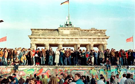 Berlin Wall anniversary: photographs from the symbolic rise and fall of the Iron Curtain