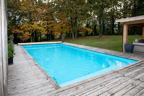 Wooden Corner of Swimming Pool with Blue Water Stock Image - Image of recreation, outdoors ...