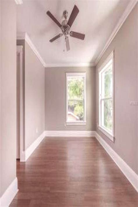 with grey walls white with grey walls white | Grey walls white trim, Brown floors, Light wood floors