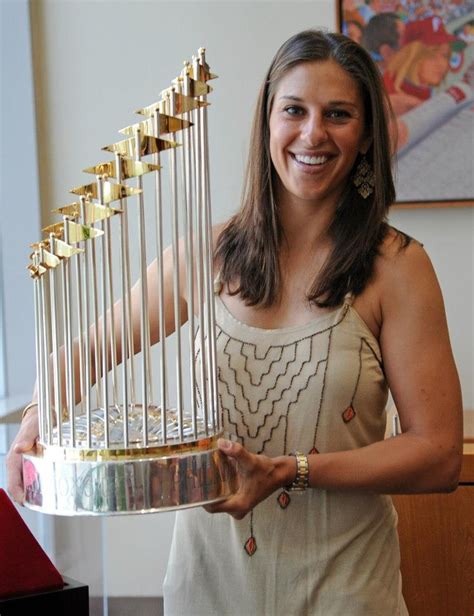 Carli Lloyd got to hold a World Series trophy when she threw out a ceremonial first pitch before ...