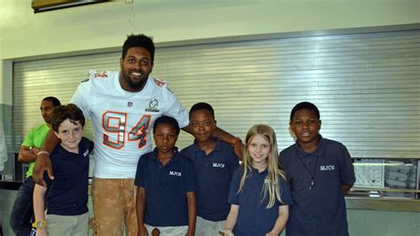 Cameron Jordan visits Morris Jeff Community School