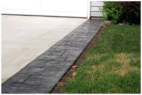 Get pavers installed along the edge of the driveway. | Stamped concrete ...