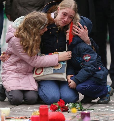 PHOTOS: Hundreds line streets to remember 34 victims killed in Brussels attacks - Rediff.com ...