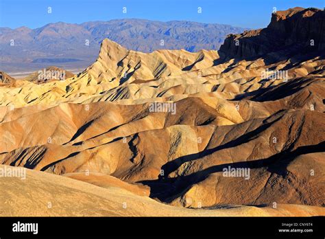 eroded badlands at Zabriskie Point at sunset, USA, California, Death ...