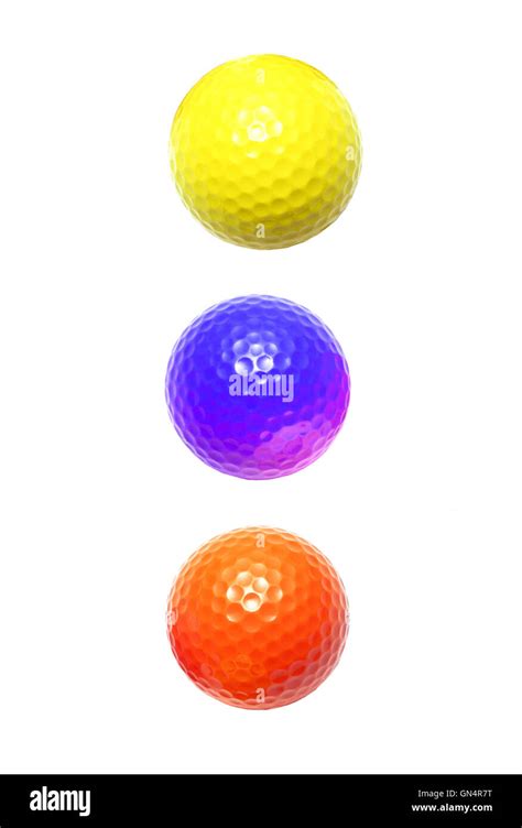 three colour golf balls Stock Photo - Alamy