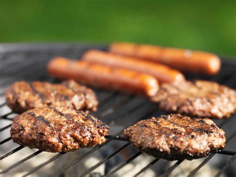 Hamburgers And Hotdogs Cooking On Grill Outdoors Stock Photo - Download ...