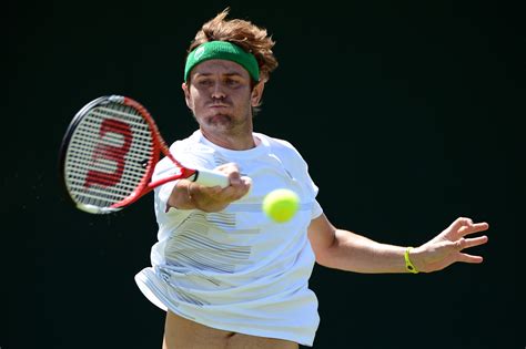 Back after heart scare, American Mardy Fish wins at Wimbledon - CBS News