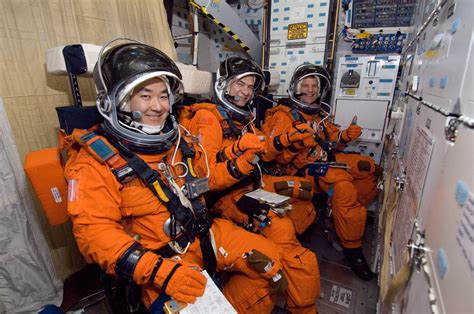 ESA - Astronauts Daniel M. Tani (left), European Space Agency's (ESA ...