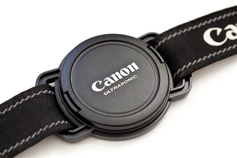 Camera Lens Cap Strap Holder | Gadgetsin