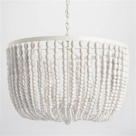 Featuring hundreds of whitewashed round wood beads cascading in dozens of strands, our four ...