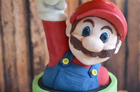 Super Mario block busting cake. - Decorated Cake by - CakesDecor