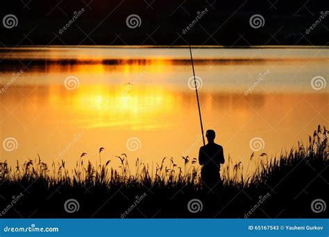 Man fishing at sunset stock image. Image of night, sport - 65167543