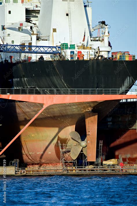 container ship in harbor dry dock for repair Stock Photo | Adobe Stock