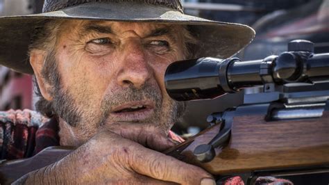 Wolf Creek's John Jarratt pulls out knife and gun mid-interview - 9TheFix