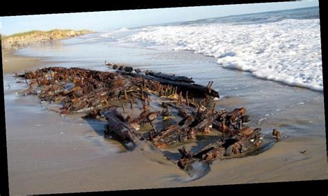 Shipwreck Emerges On North Carolina Beach, Disappears In Sand ...