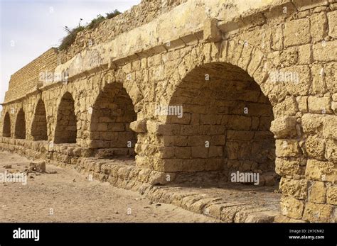 Roman aqueduct in Caesarea Maritima , Israel, Caesarea Stock Photo - Alamy