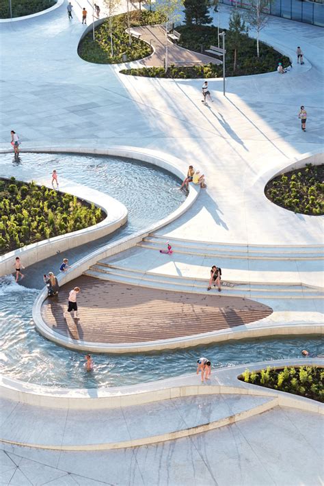 3Deluxe creates public plaza with fluid geometry that meets young ...