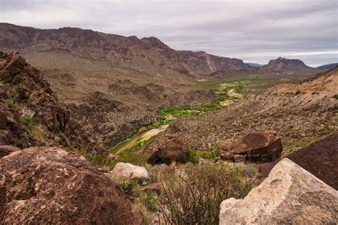 Arid Desert Landscape Featuring a Winding Pathway Meandering Across the ...