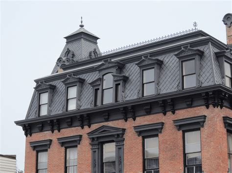 The mansard roof is the character-defining feature of the Second Empire style. A mansard is ...