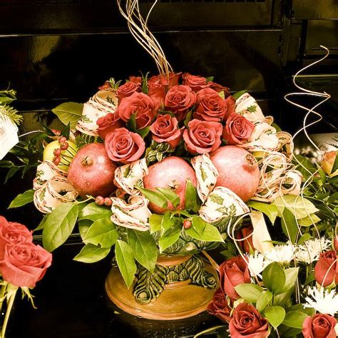 Pomegranate Flower arrangement. Would enjoy seeing this on my table. Table Arrangements, Floral ...