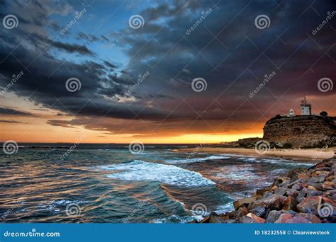 Lighthouse and Ocean Sunset Stock Photo - Image of seascape, light: 18232558