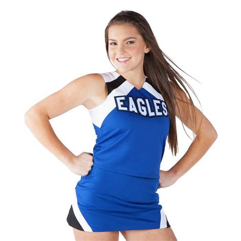 a woman in a cheer uniform posing for the camera