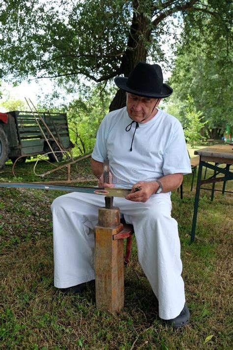 Farmer Sharpening His Scythe Editorial Stock Photo - Image of meadow, human: 96417288