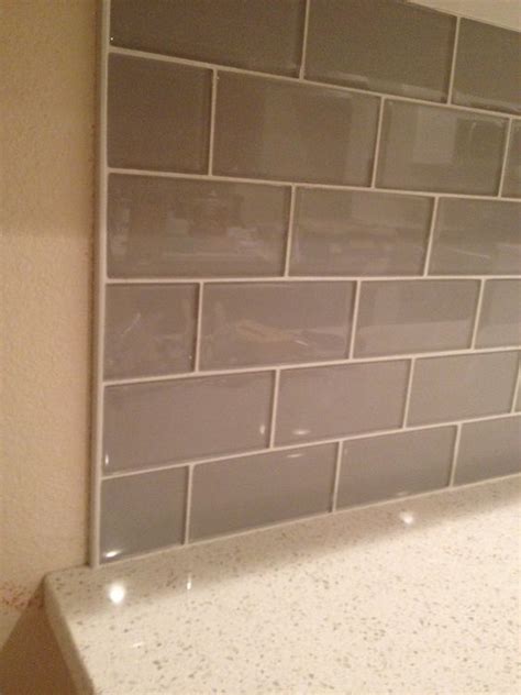 Smoke Glass Backsplash with Metal Edging | Kitchen! | Pinterest | Metal ...