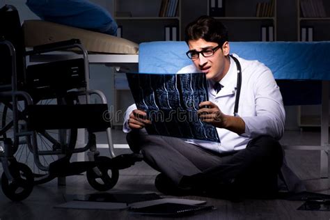 The Doctor Working Night Shift in Hospital after Long Hours Stock Image - Image of healthcare ...