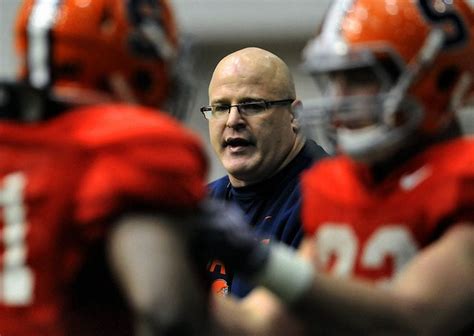 Syracuse University football assistant coaches use their past to ...