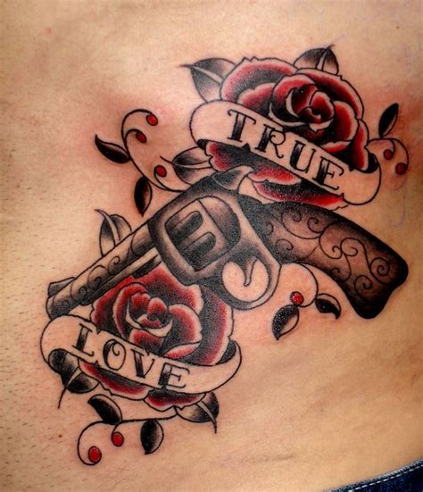 Lettering Tattoo with Guns and Roses