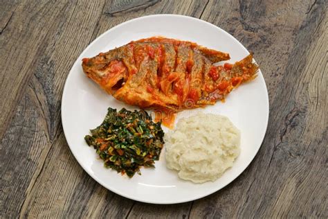 Traditional African Food Ugali Fish Greens Stock Photos - Free ...