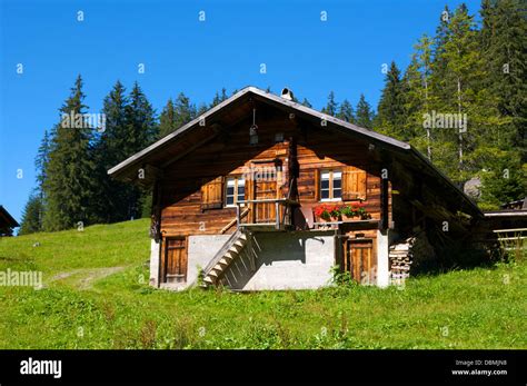 A traditional Swiss Chalet in Adelboden village in the Bernese Alps, Switzerland in summer Stock ...